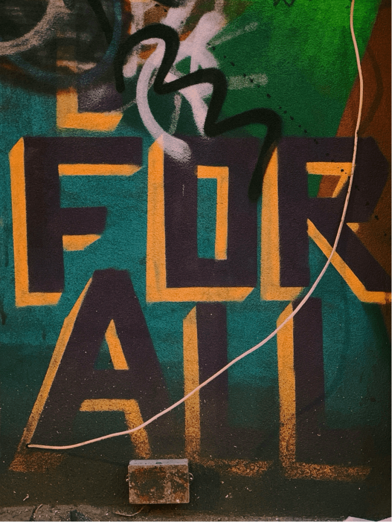 a wall painting in greens and blues featuring the phrase 'for all'
